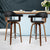 Cassius Wooden Pair Of Swivel Kitchen Bar Stool In Black Leather